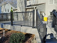 <b>Trex Transcends Island Mist decking and fascia with black aluminum railing</b>